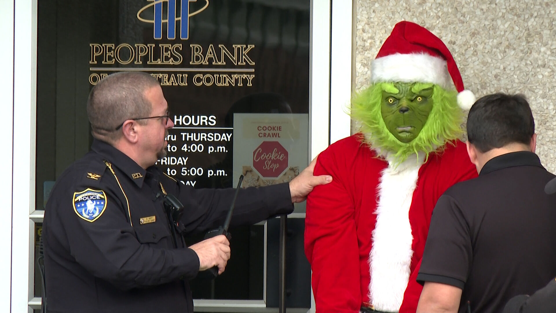 Grinch gets caught at the Peoples Bank of Moniteau County
